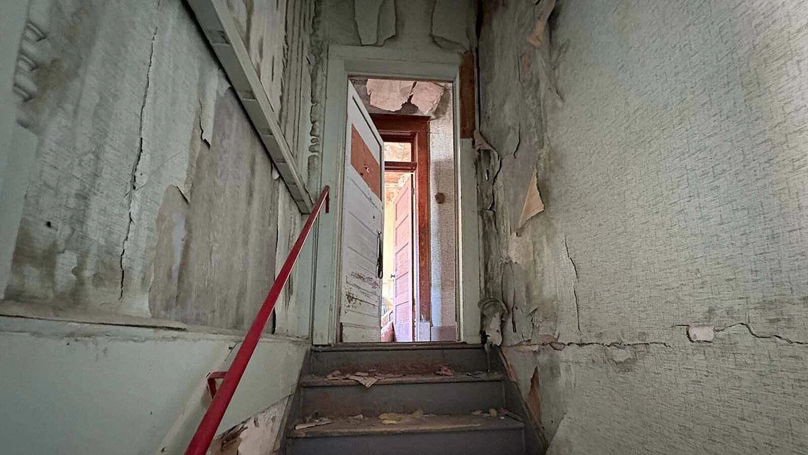 A volunteer once ventured up these stairs and his flashlight mysteriously dimmed. As he was leaving, according to owner Jessica Fritz, the door slammed behind him.