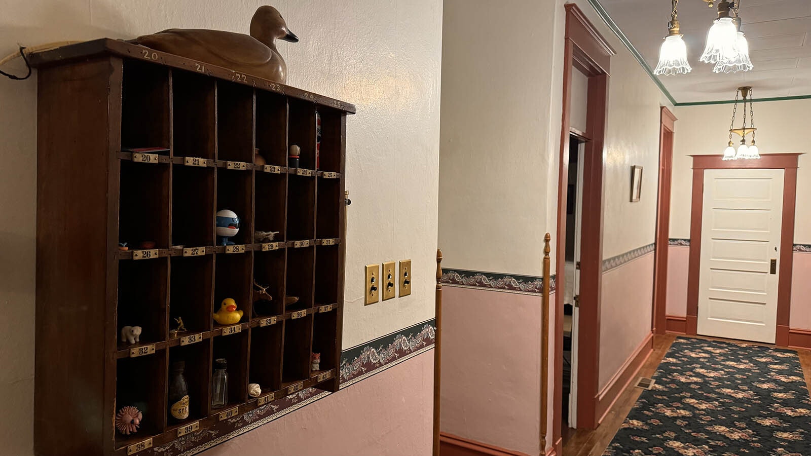 Remnants of the past remain from nearly 100 years ago at the Greybull Hotel such as the old mail slots.