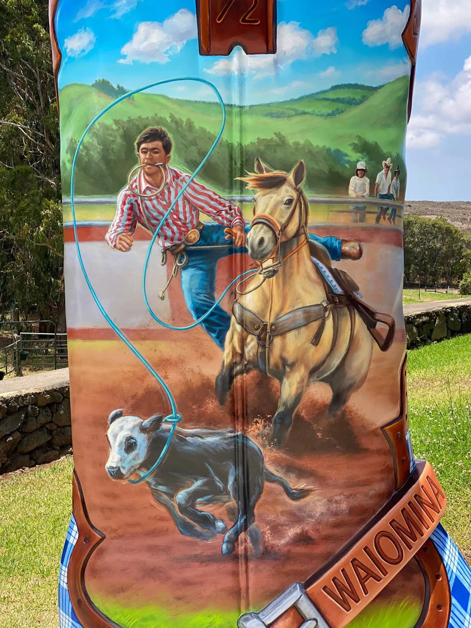 An image of the late Holi Bergin roping a calf is featured on the boot.