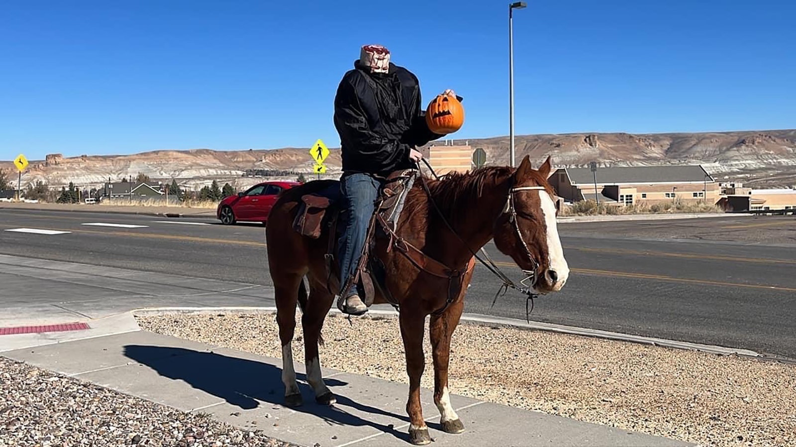 Colton Kraft as the Headless Horseman on his annual ride through Green River on Halloween.