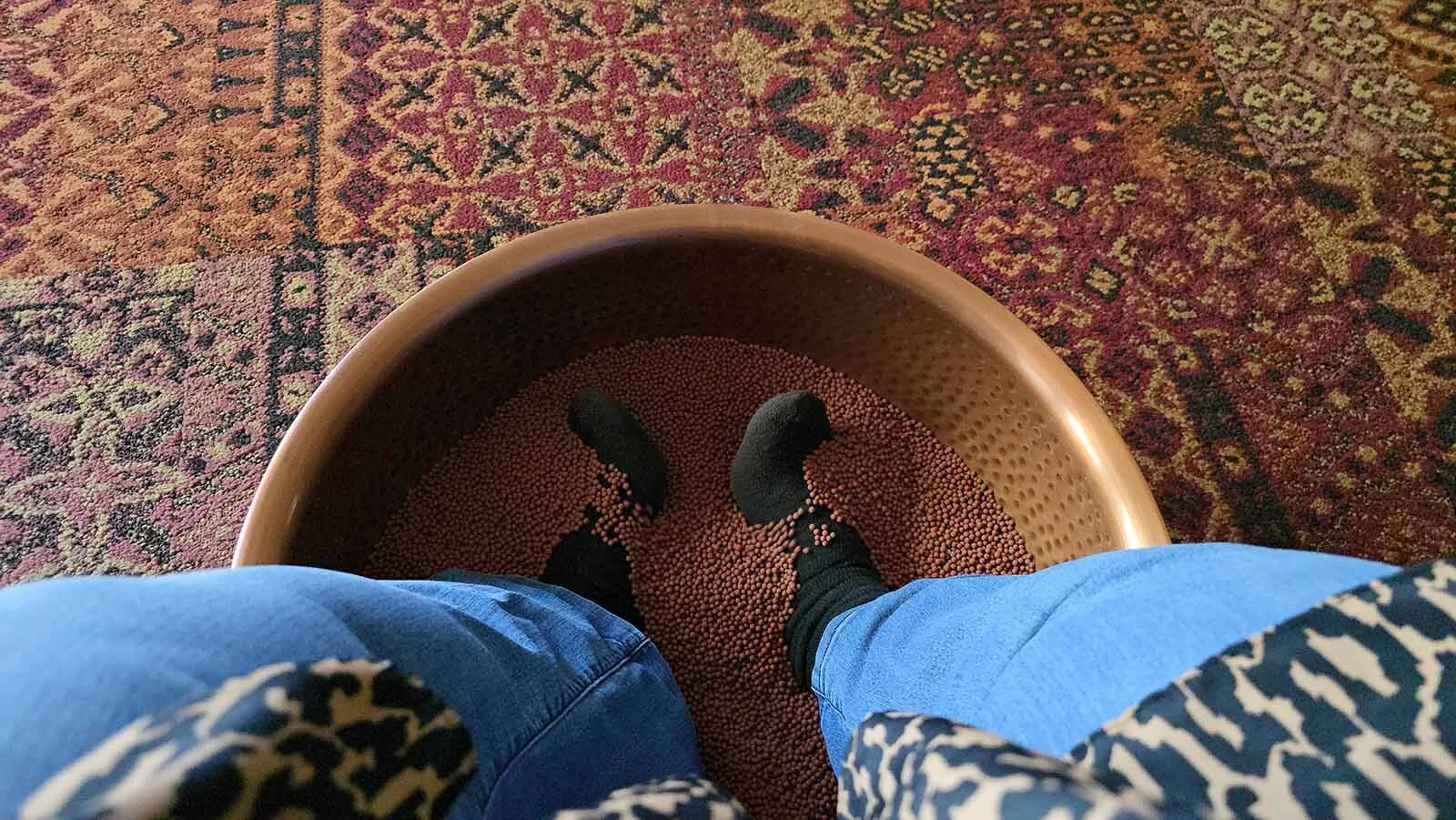 A copper bowl of heated clay beads is supposed to soothe tired feet at the Ember Lilly Spa, which is part of the former Snow King Resort in Jackson, now known as Trailborn.