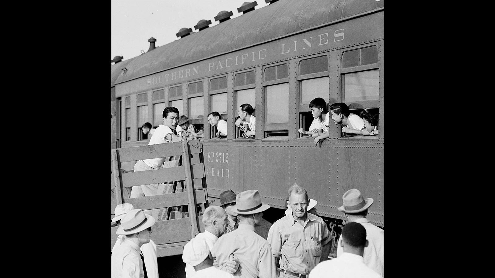 Japanese-American internees arrive by train at the Heart Mountain Relocation Center.