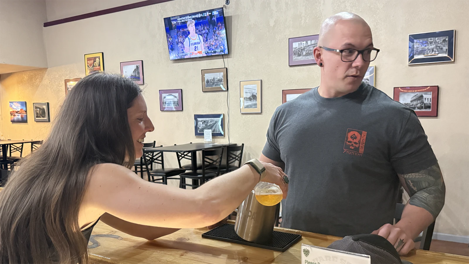 Cassandra Vincelette pours a drink into the mug used for the challenge at Square State Brewing in Rock Springs.