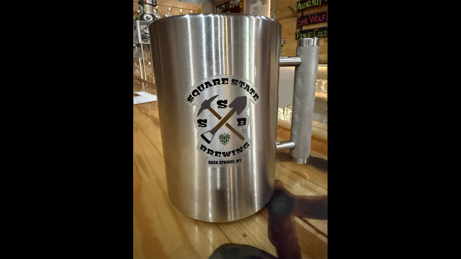 A stainless steel mug used in the strength challenge sits on the bar at Square State Brewing in Rock Springs. The mug weighs 31 pounds.