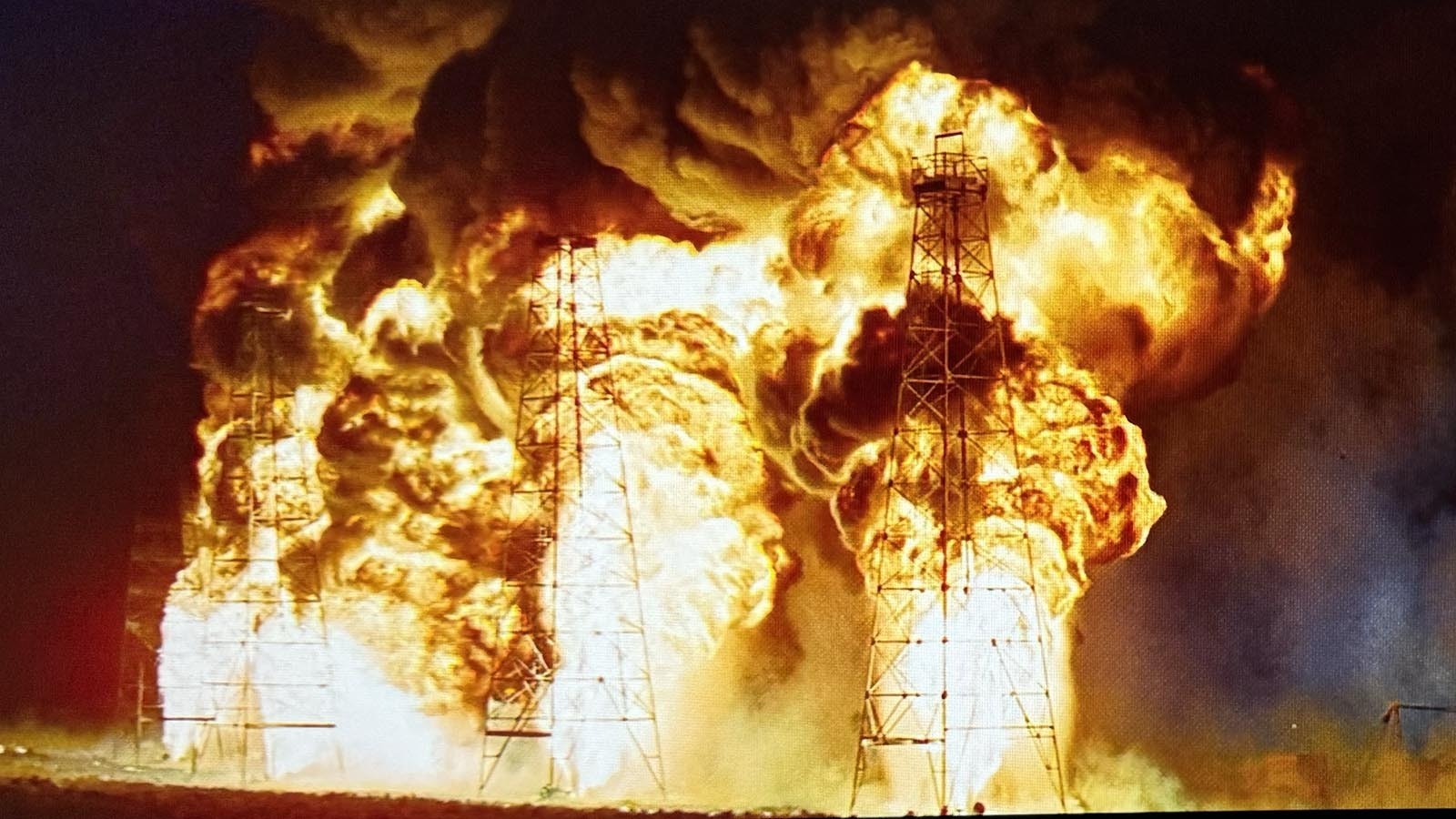 Some of the most spectacular scenes in "Hellfighters" were of a row of five oil rigs on fire, which was filmed on a ranch near Casper.