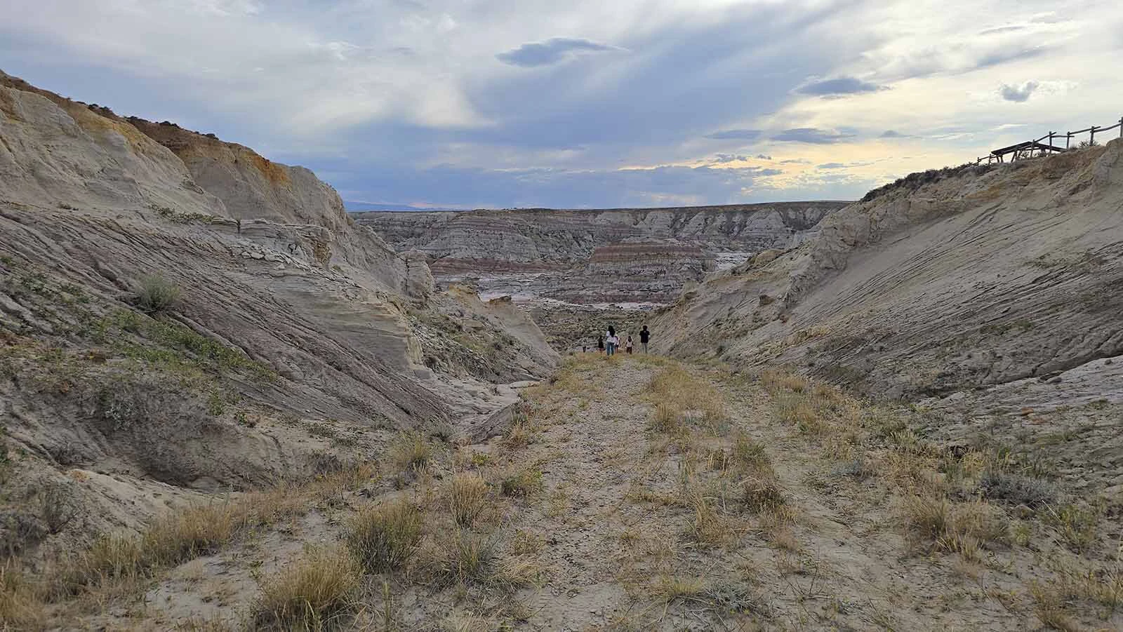 A gravel road descends into Hell's Half Acre 40 miles west of Casper.