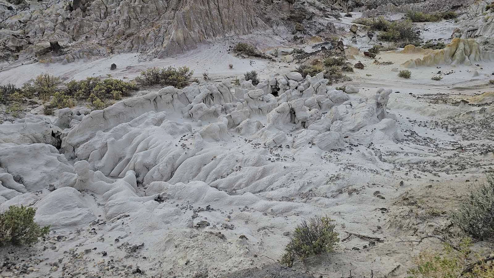 Wind, water and time have carved odd shapes into Hell's Half Acre, 40 miles West of Casper.