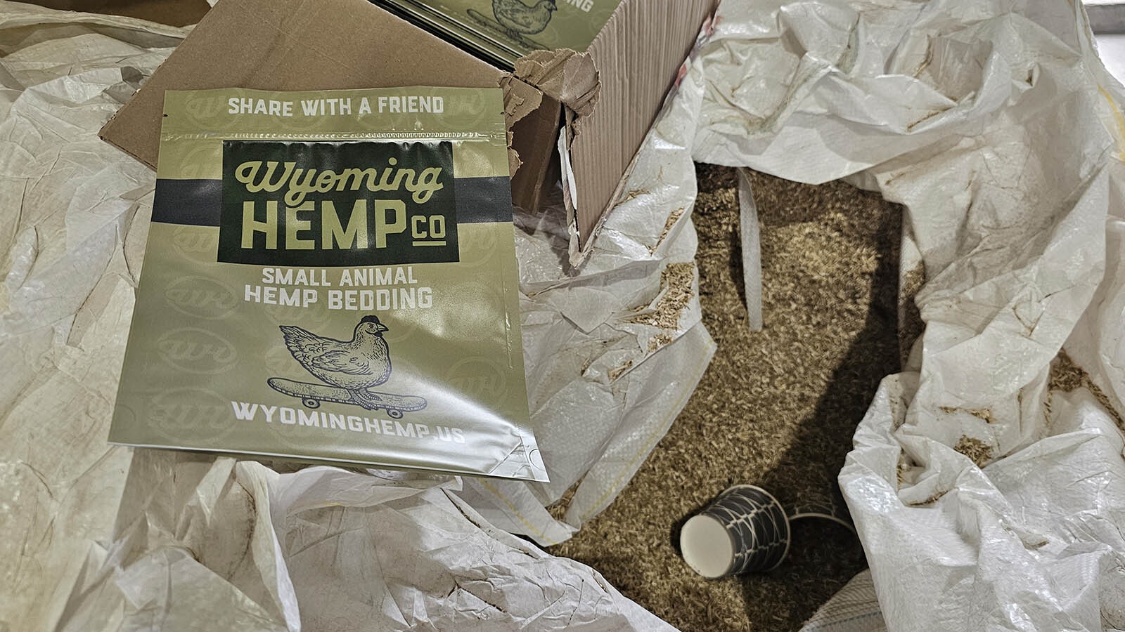 Sample bags of bedding that Justin Loeffler gives away for people to give hemp bedding a try. Hemp is resistant to mites and helps curtail ammonia.