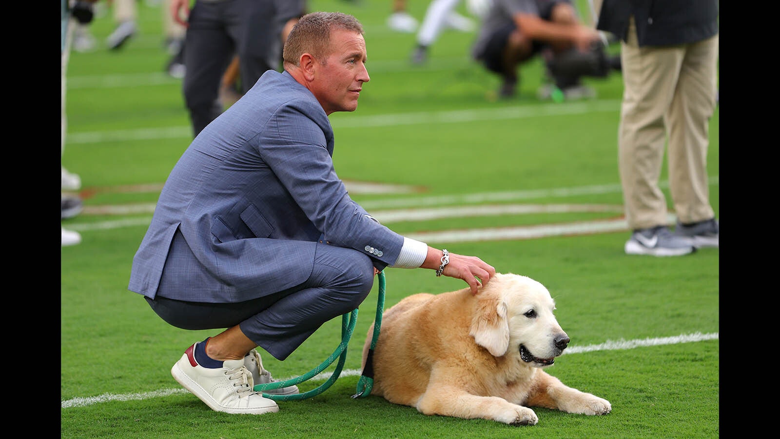 ESPN sportscaster Kirk Herbstreit and his dog Ben look on before the game between the Alabama Crimson Tide and the Georgia Bulldogs at Bryant-Denny Stadium on Sept. 28, 2024 in Tuscaloosa, Alabama.