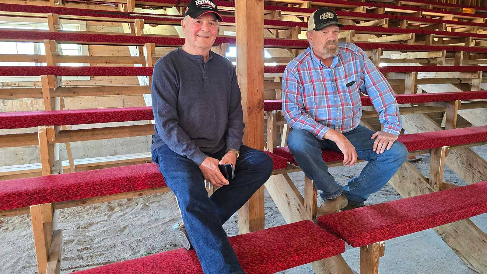 Dennis Spatz, left, sits where John Wayne used to sit while Gene Stillahn looks on.