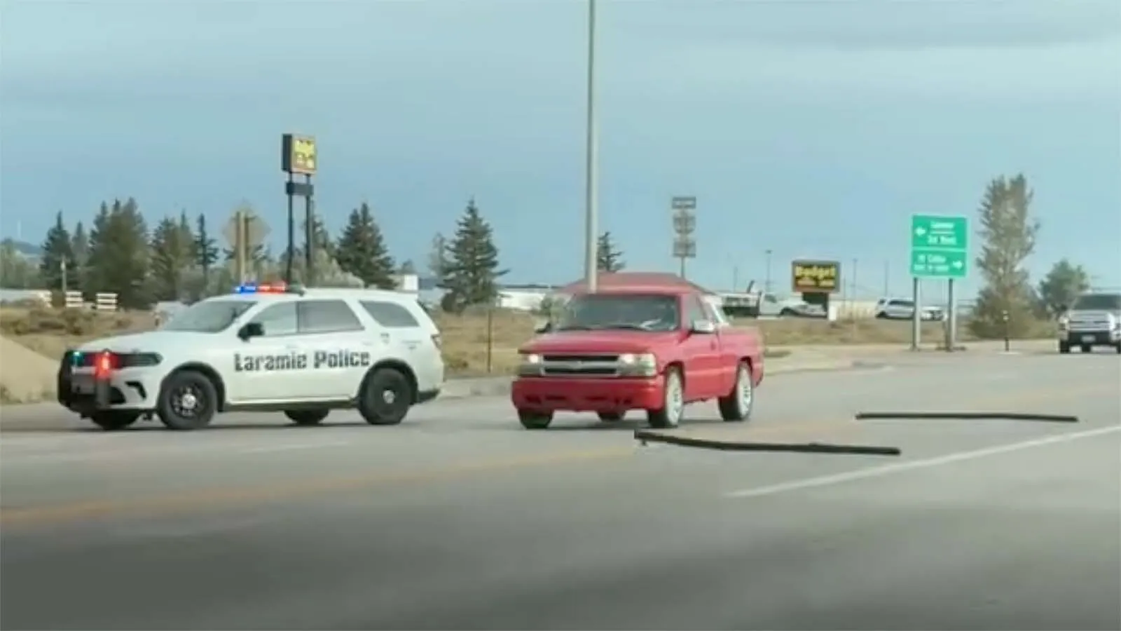 A Colorado fugitive was arrested after a 100-mph chase on U.S. 287 into Laramie that continued on a bare rim until the driver crashed through a cattle gate. A roadside witness took video and cheered as police raced past: “Go get ’em boys! Go get ’em.”
