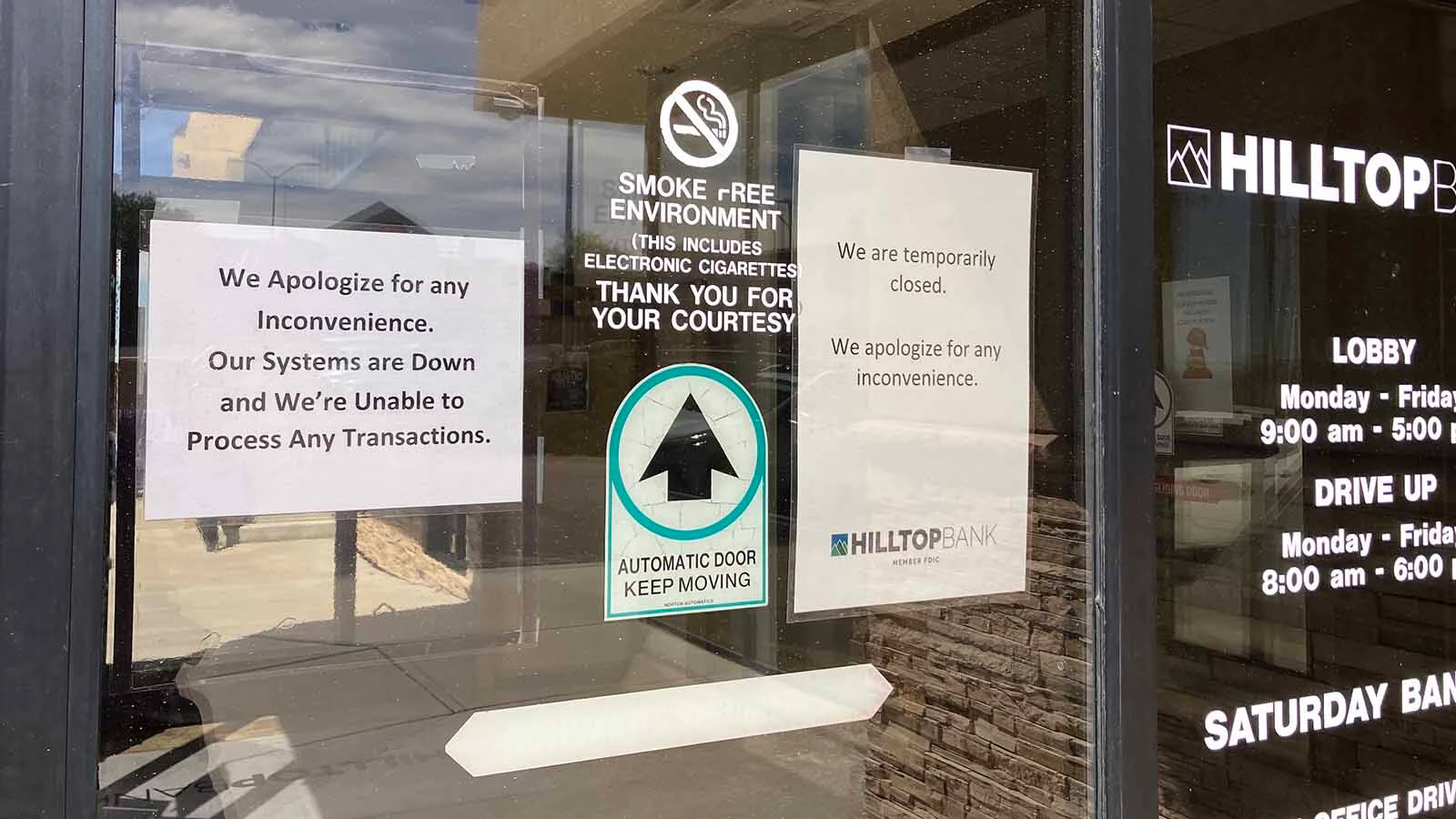Hilltop Bank branch in Casper tells customers that services are offline.