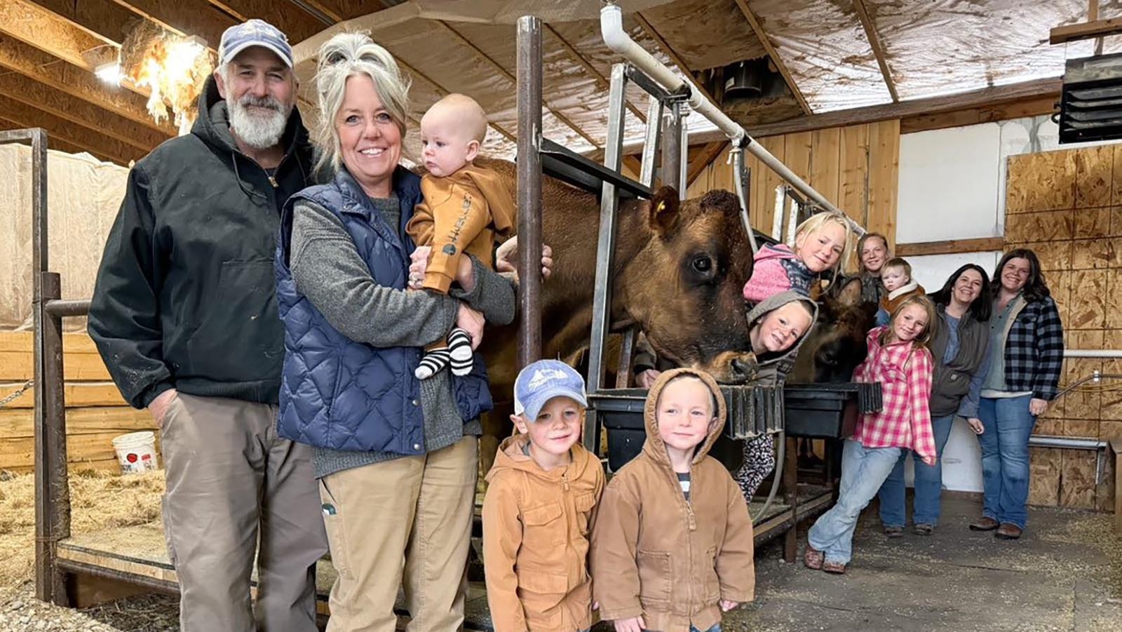 Mark and Mary Nelson with their grandchildren and daughters, Maggie Haron and Sadie Howard. Hippie Cow Creamery has become a full-time family business selling raw, unpasteurized milk to families in Cody and northwest Wyoming.