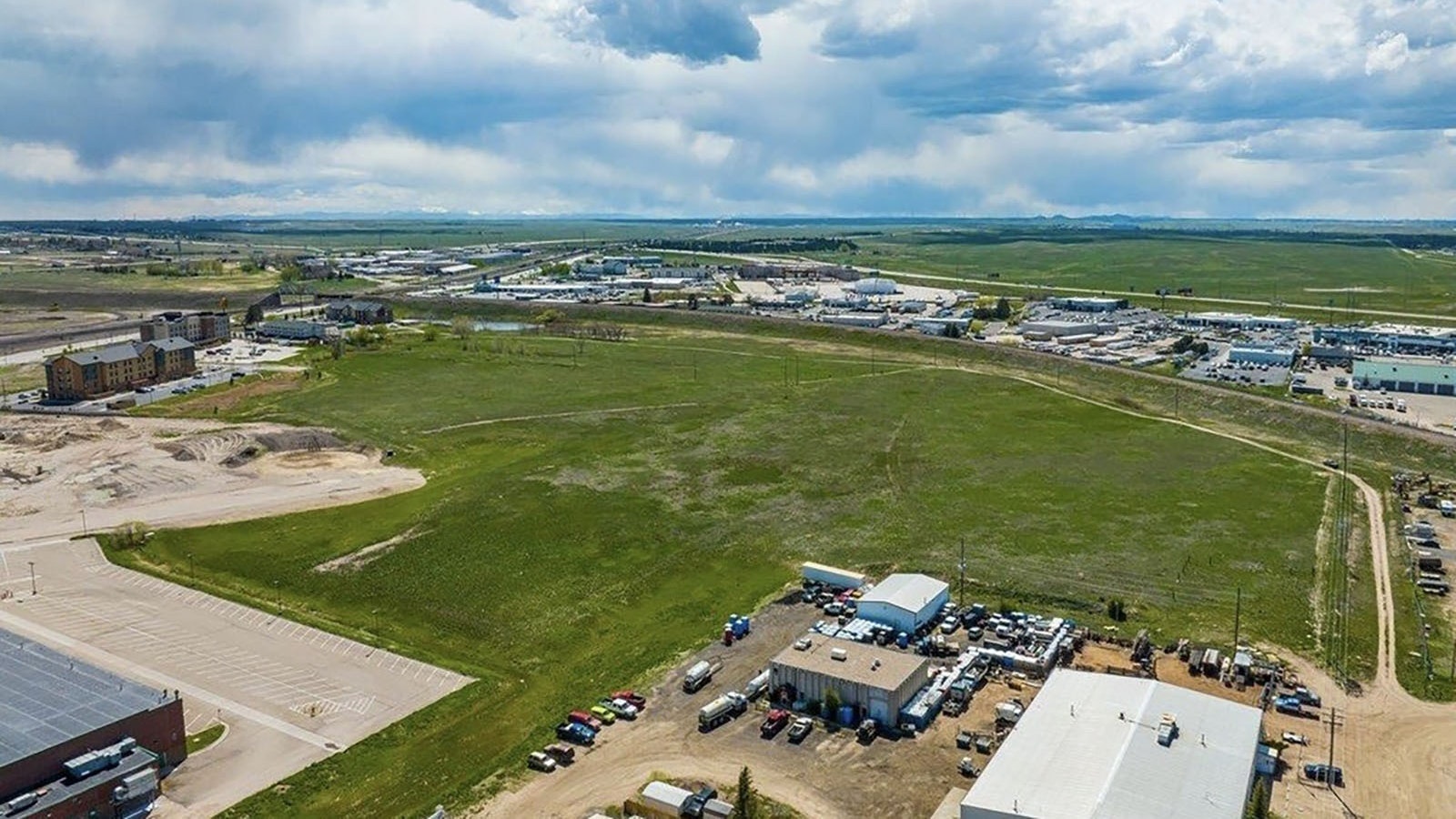This parcel behind the site of the former Hitching Post Inn, left, could become an affordable housing development in Cheyenne.