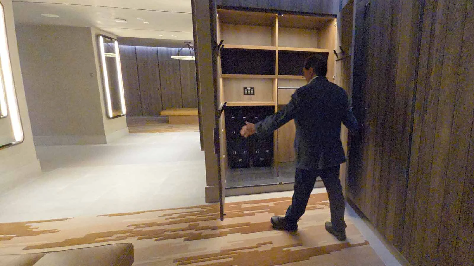 Nelson Veiga opens the sky lockers at Hoback Club.