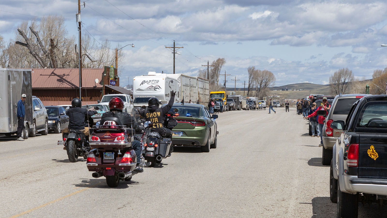 Organizer Jonas Black and other riders in Hogs for Hope roll into Daniel, Wyoming, on May 26, 2024. The rally had planned to stop at the Green River Bar, but it had been blocked by locals with trucks and horse trailers, left.
