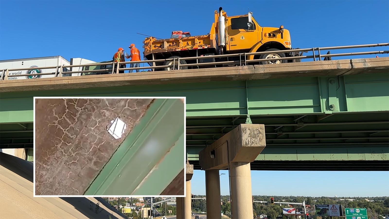 A Wyoming Department of Transporation crew works to repair a hole that develped in the right eastbound lane of Interstate 80 over the Greeley Highway in Cheyenne.