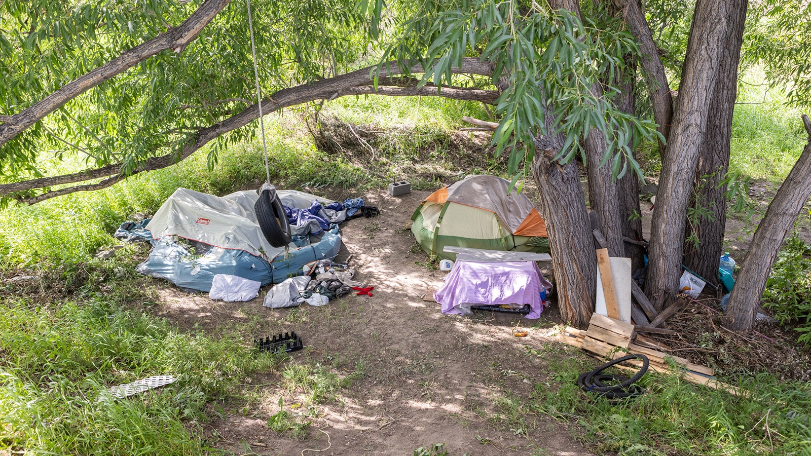 A homeless camp near Carey Avenue at West 3rd Street and Deming Drive along Crow Creek in Cheyenne, Wyoming.