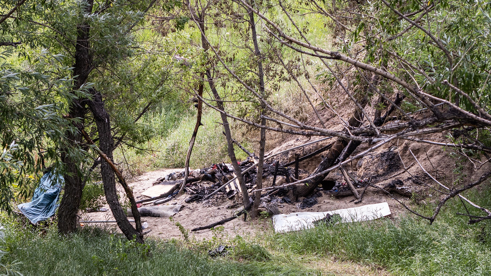 A burned out homeless camp along Crow Creek near the Trail's End area in Cheyenne.