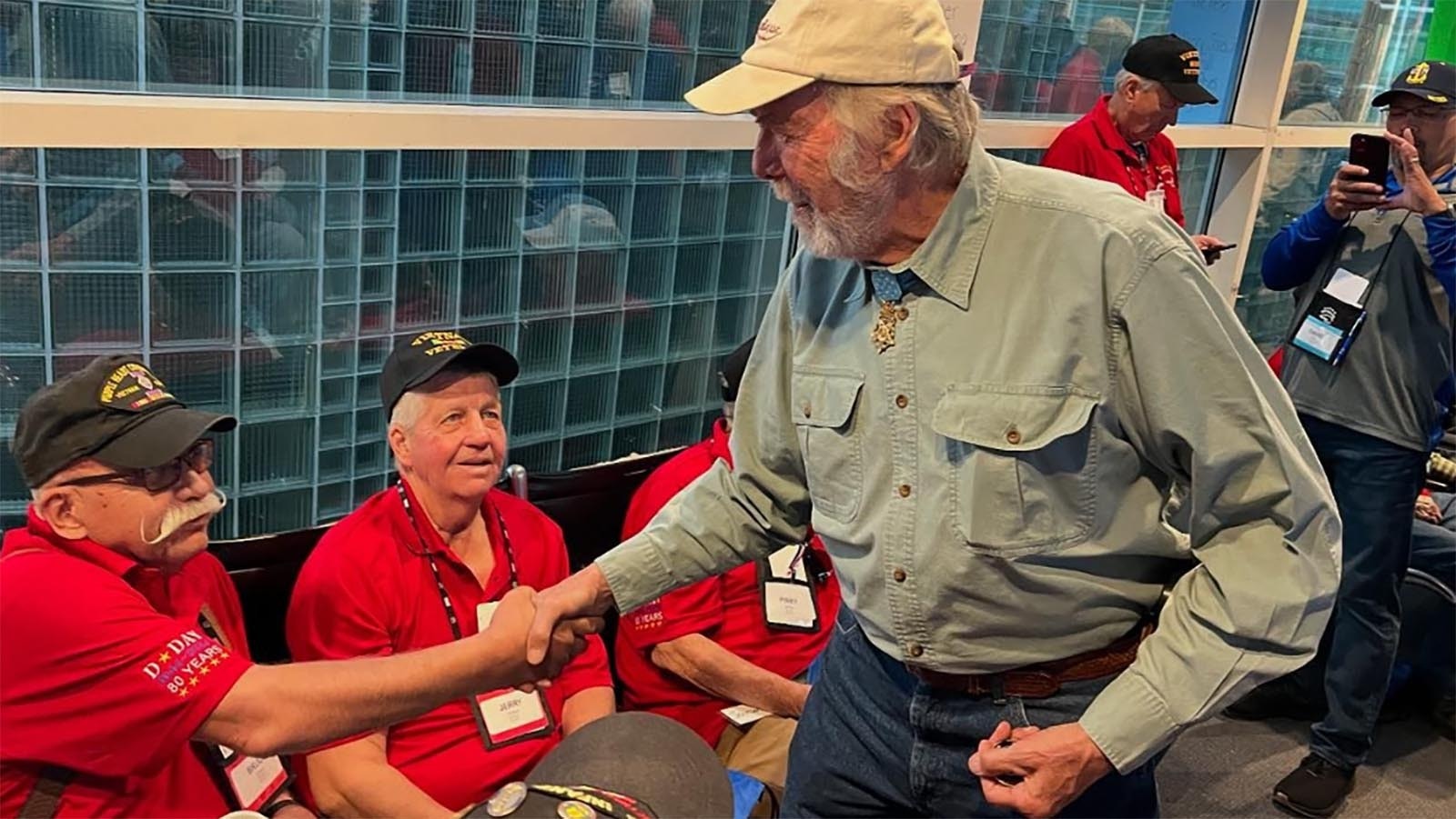 Rocky Mountain Honor Flight veterans received a sendoff from Medal of Honor recipient Drew Dix at Denver International Airport.