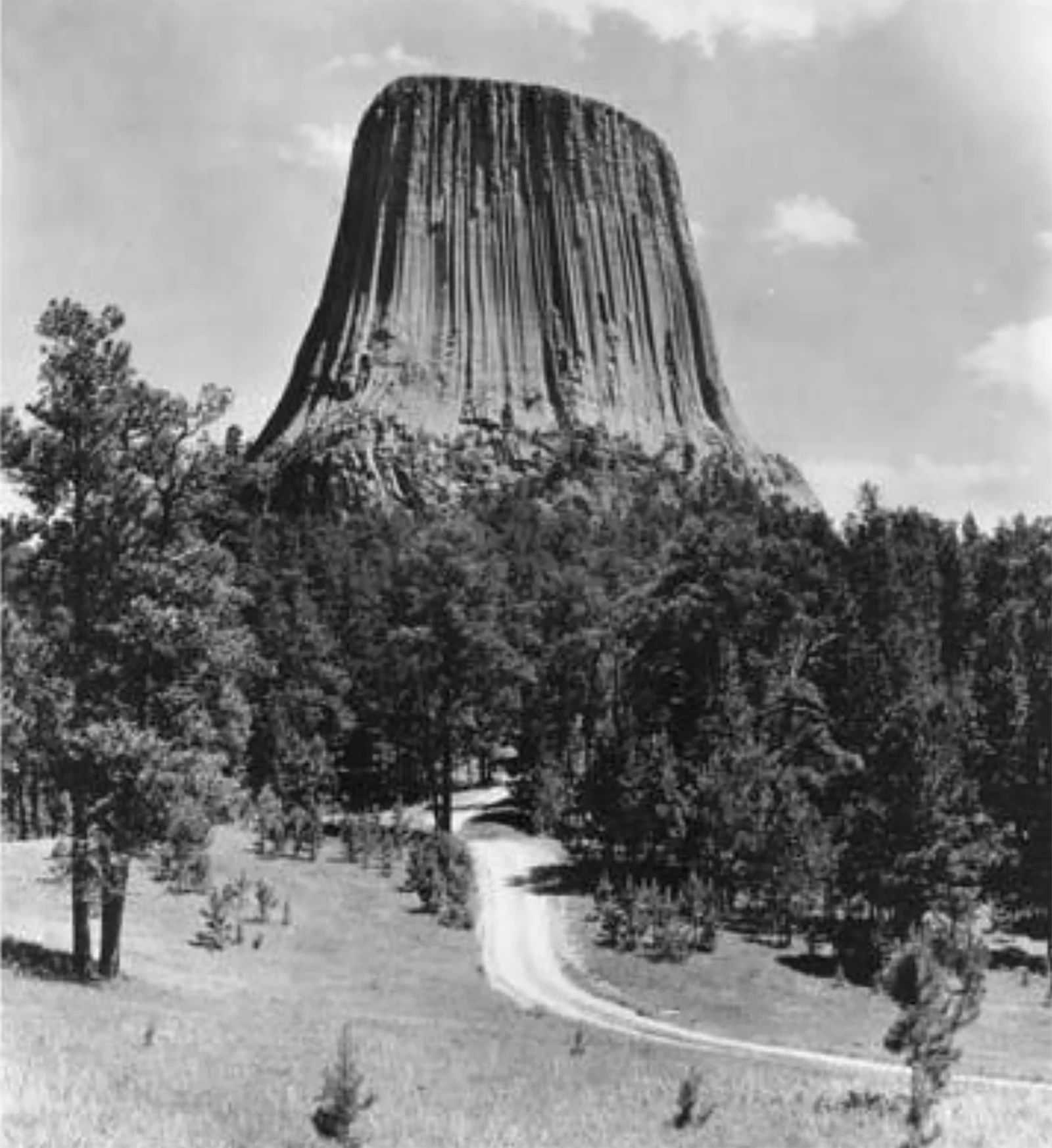 In the late 1800s, the Axelby Gang had a hideout in Crook County near Devil’s Tower. It was believed by locals in the 1930s that an old cabin on the Cross Anchor Ranch, 22 miles away from Devil’s Tower as the crow files, was one of their hideouts along the Horse Thief Trail. This photo was taken in July 1928.