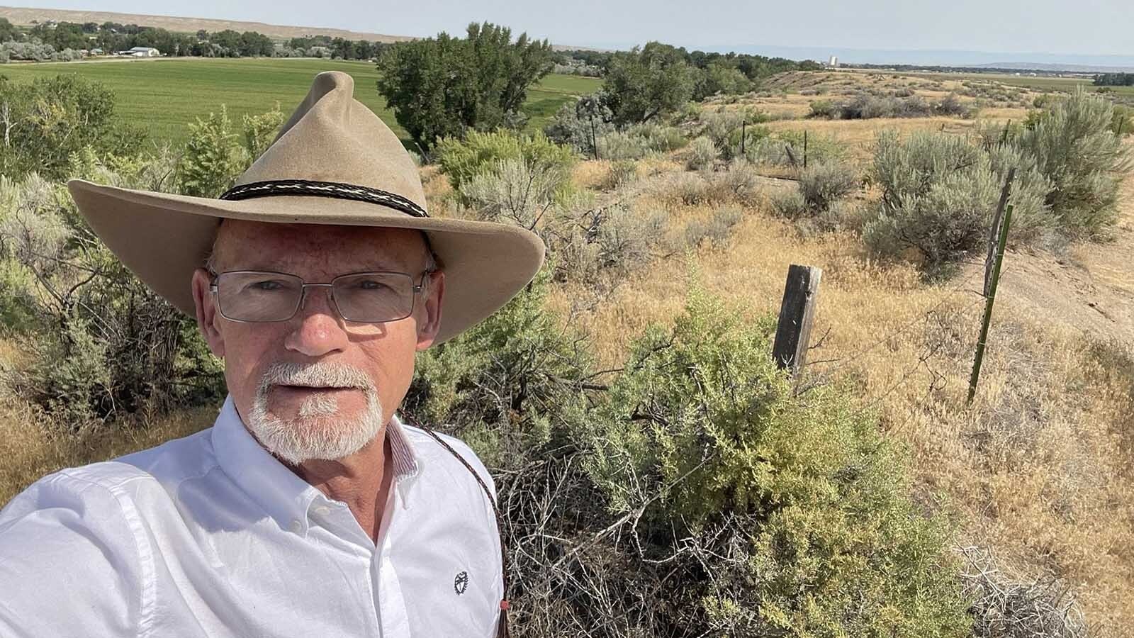 In 1894, Alfred Slick Nard, one of the survivors of the Horse Thief Wars, ambushed and tried to kill a sheepherder. Mike Bell found the spot where the attempted murder took place just outside of Worland, Wyoming. He said, "The old road continues along the ridge to my left - your right. The ambush site is above my hat on the flats.”