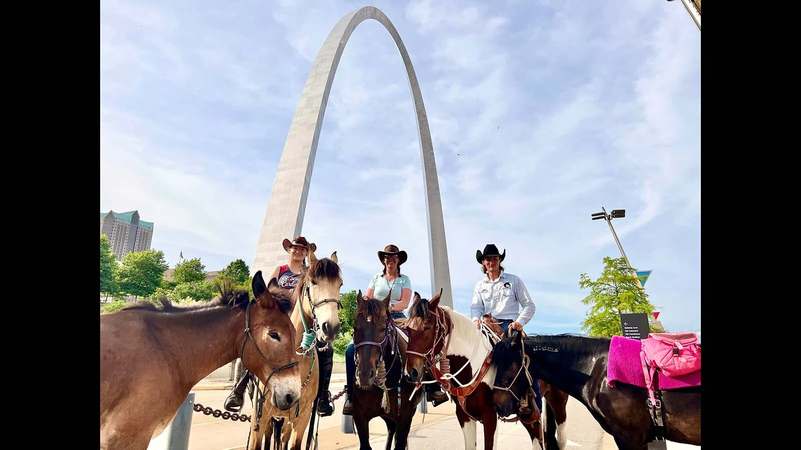 When Lisanne Fear sat down to write a suicide note, she couldn't bring herself to part with a mustang named Phineas. That decision led to the Pinedale, Wyoming, woman's 5,000-mile ride across the U.S. Above, a stop at the St. Louis Arch.