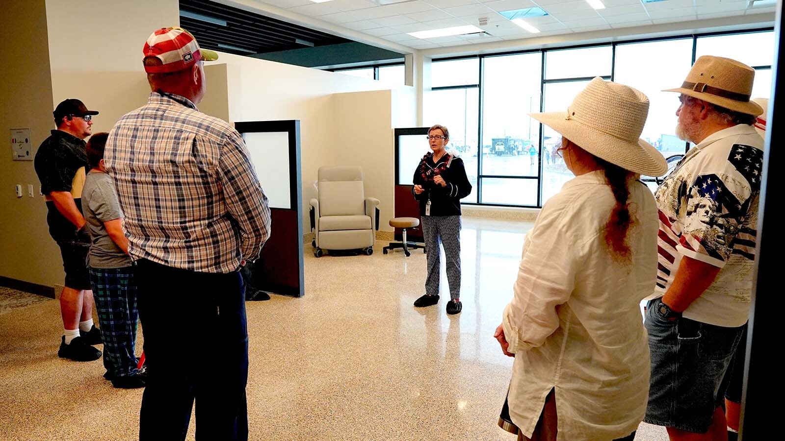 Patty Hoskinson conducts a tour at Hoskinson Health & Wellness Clinic in Gillette during the Fourth of July groundbreaking ceremonies.