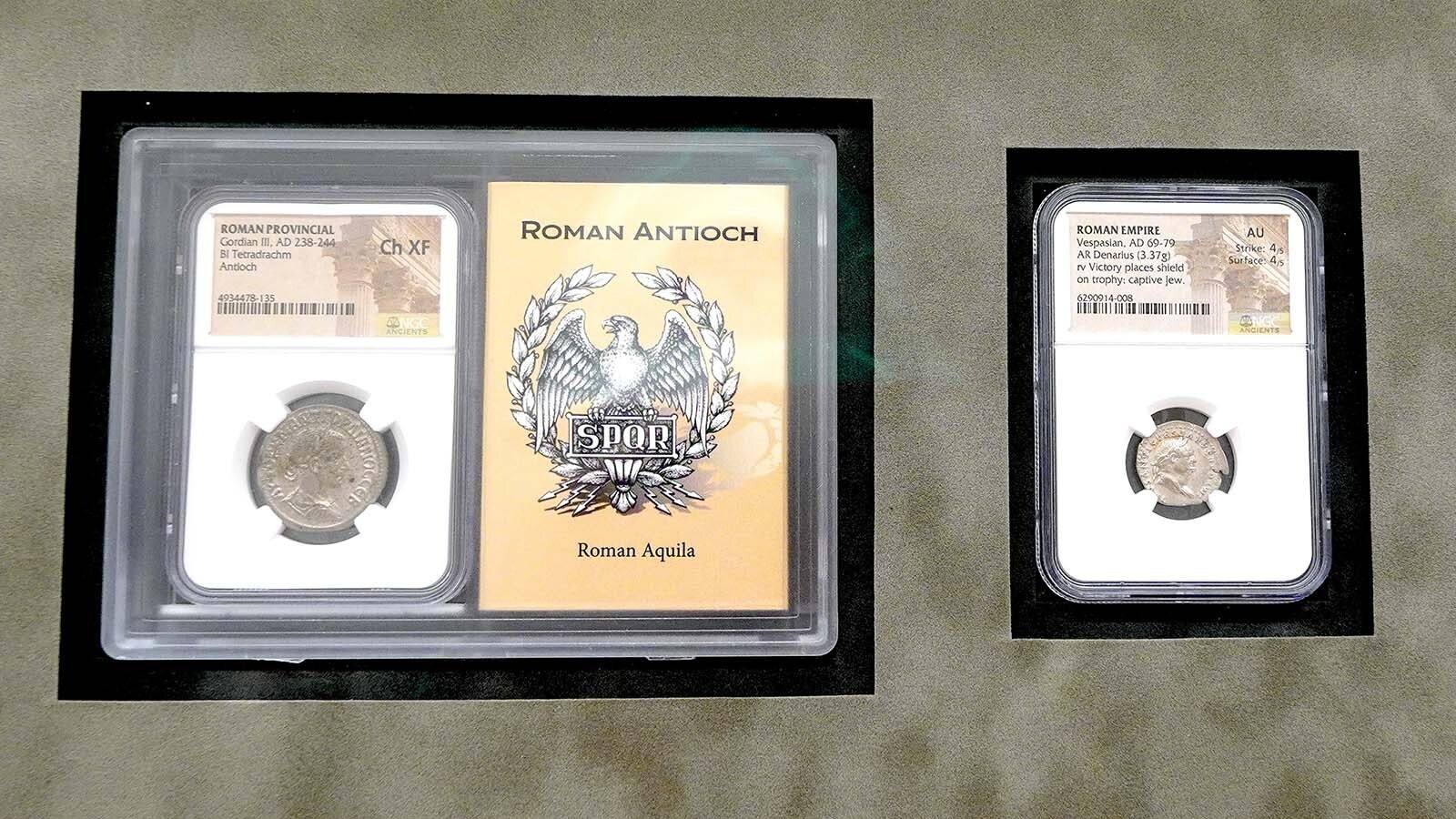 Two Roman coins hang on the wall of the Hoskinson Health & Wellness Clinic in Gillette.