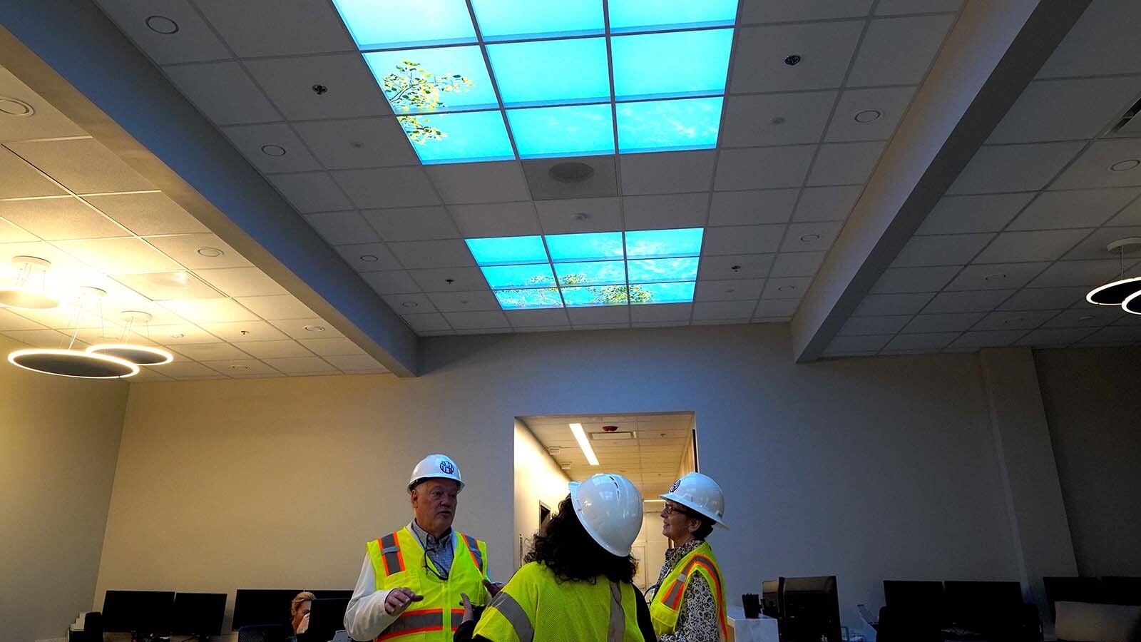 Patty and Mark Hoskinson explain to Cowboy State Daily how because of concrete poured on the top of the clinic building, natural skylights weren’t possible. So, they decided to create fake ones, which have the same feel as natural light shining down.