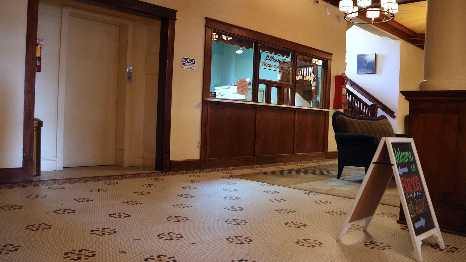 The lobby of the historic hotel still boasts its original tile floor.