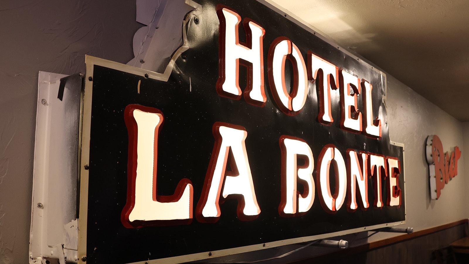 Hotel LaBonte owner Macey Moore found an old sign for the hotel in the basement. She had it brought up to the hotel bar and placed on the wall.