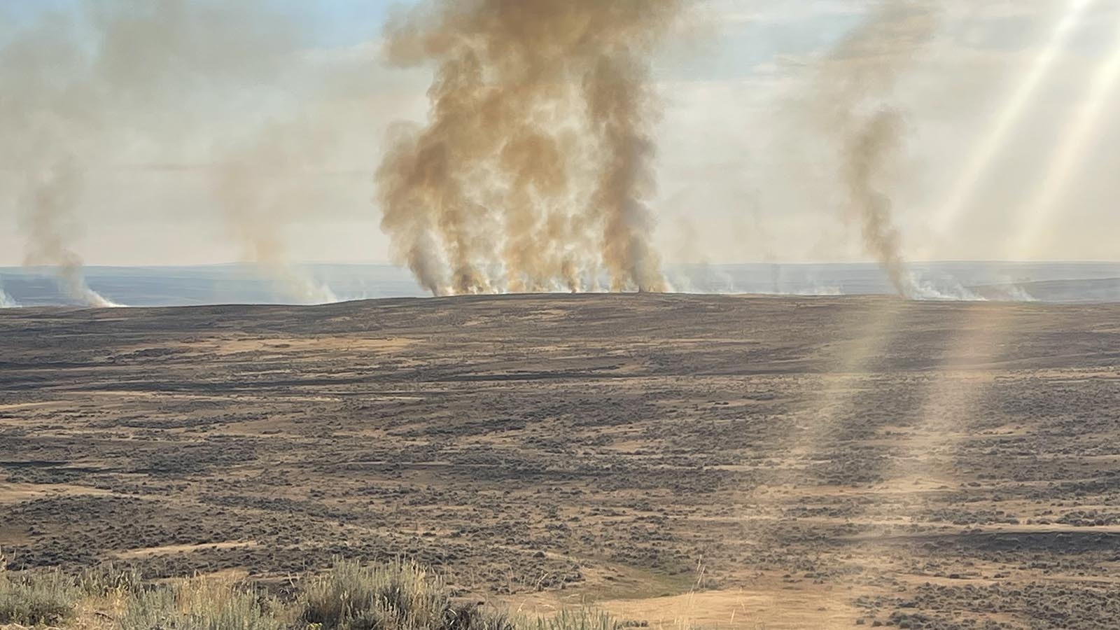 Above, the House Draw Fire threatened sheep ranching operations along Buffalo Sussex Cutoff Road in Johnson County.