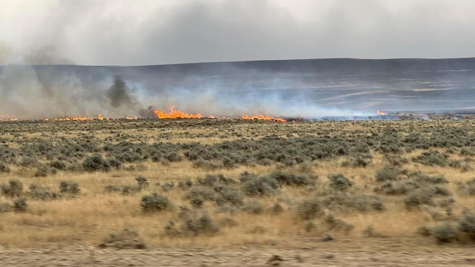 As seen from Reno Hill off of Buffalo Sussex Cutoff Road, the House Draw Fire threatens sheep ranching operations.