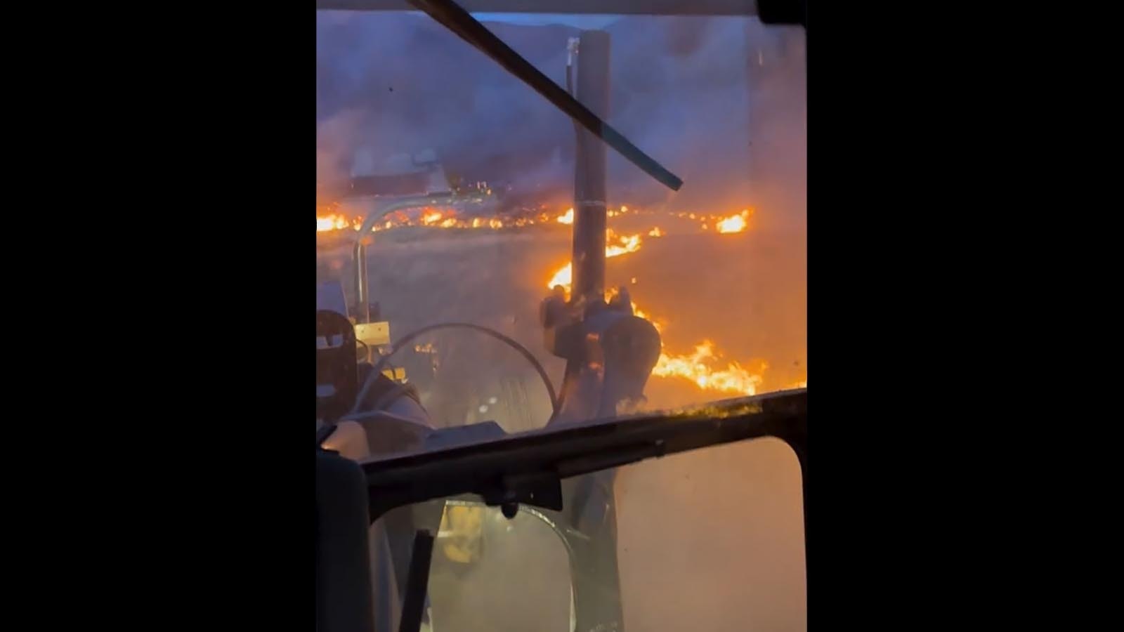 View of the House Creek Fire from the seat of a construction rig.