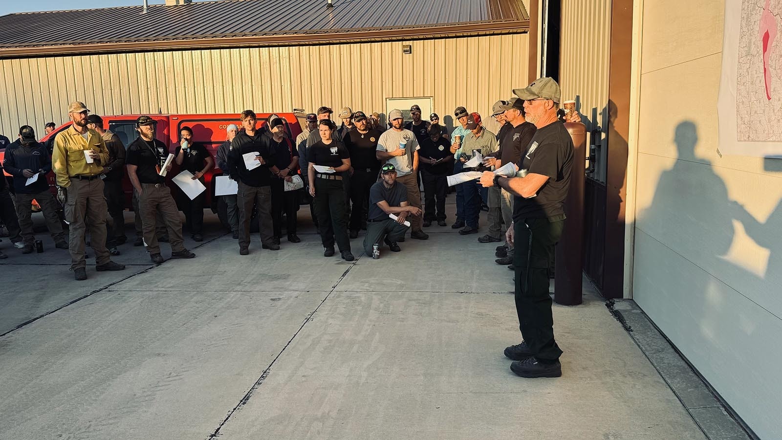 At 6:30 a.m., about 150 firefighters receive a briefing on the 174,000-acre House Draw Fire at the Buffalo Volunteer Fire Department.