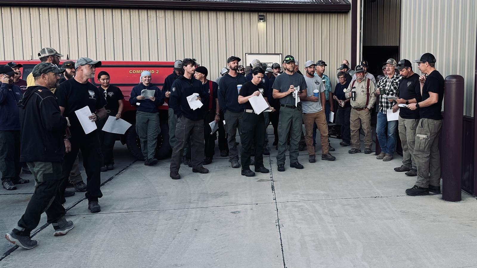 At 6:30 a.m., about 150 firefighters receive a briefing on the 174,000-acre House Draw Fire at the Buffalo Volunteer Fire Department.