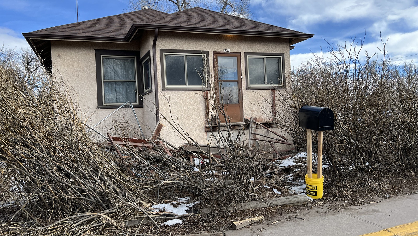 The front steps and porch of this house were taken out by a car that led Laramie police on a chase exceeding 100 mph at one point.