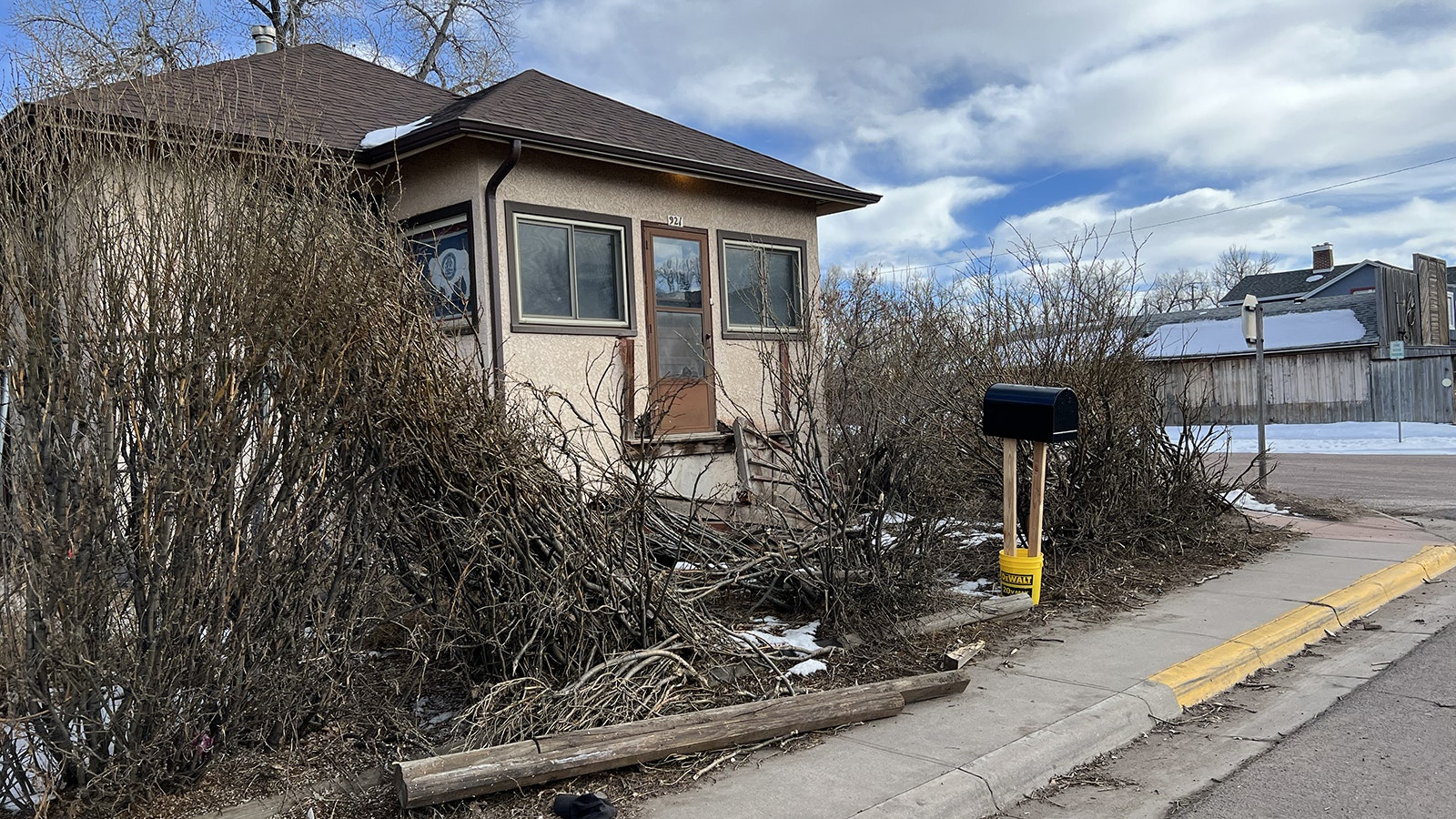 The front steps and porch of this house were taken out by a car that led Laramie police on a chase exceeding 100 mph at one point.