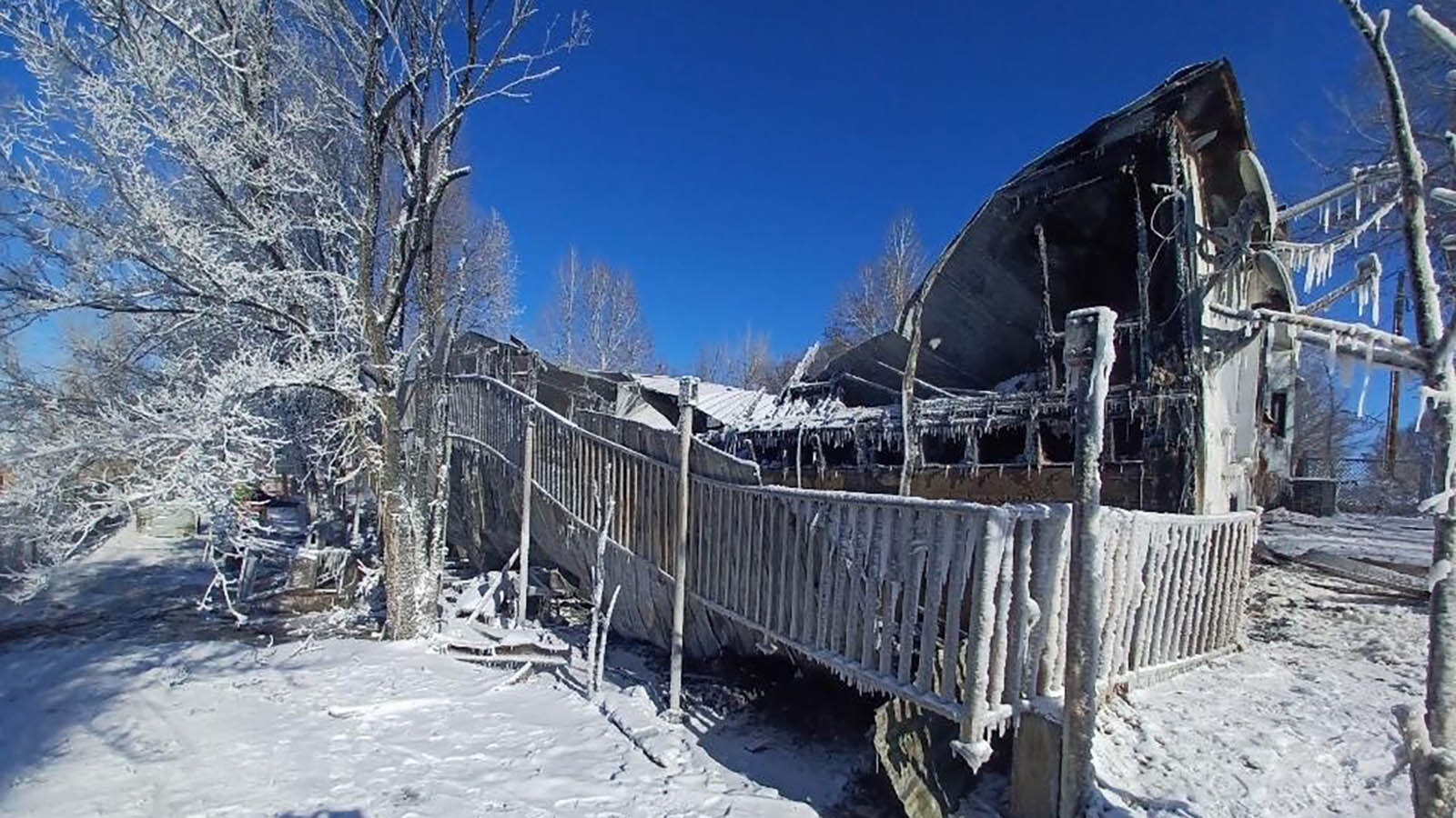 The charred remains of the Watts family home in Hudson, Wyoming, the day after it burned.
