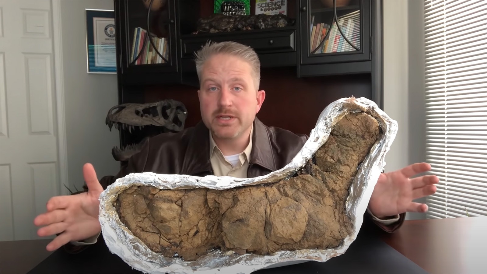 The crown jewel of George Frandsen's collection of fossilized dinosaur poop is this specimen, the largest prehistoric poop ever discovered.