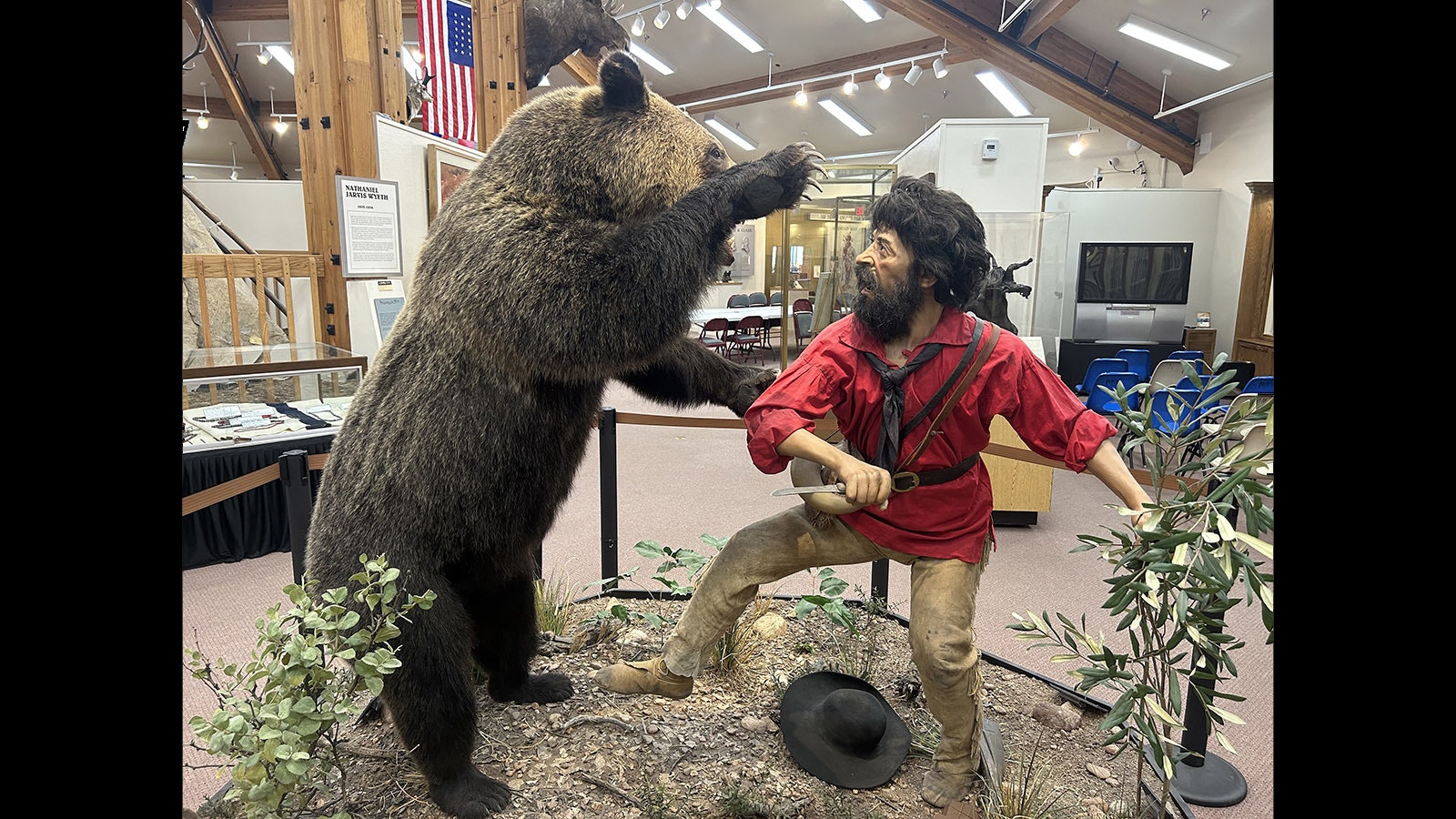 Another angle of the encounter between mountain man Hugh Glass and a grizzly sow that happened in South Dakota in the early 1820s. In the background is the Museum of the Mountain Man collection of commemorative Winchester rifles.