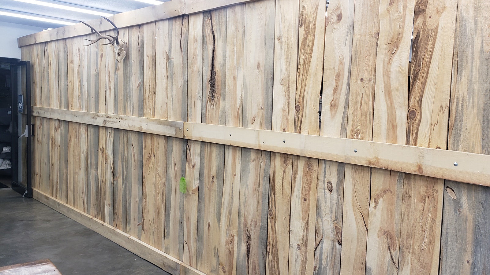 The wood wall in the Hulett Hardware Store's coffee shop Sego Lily is made from wood Jake Barlow milled himself.