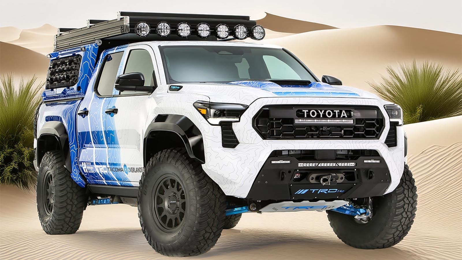 Toyota shows off a hydrogen fuel-cell-powered concept truck that will produce clean water for camping as a byproduct of its hydrogen fuel system.