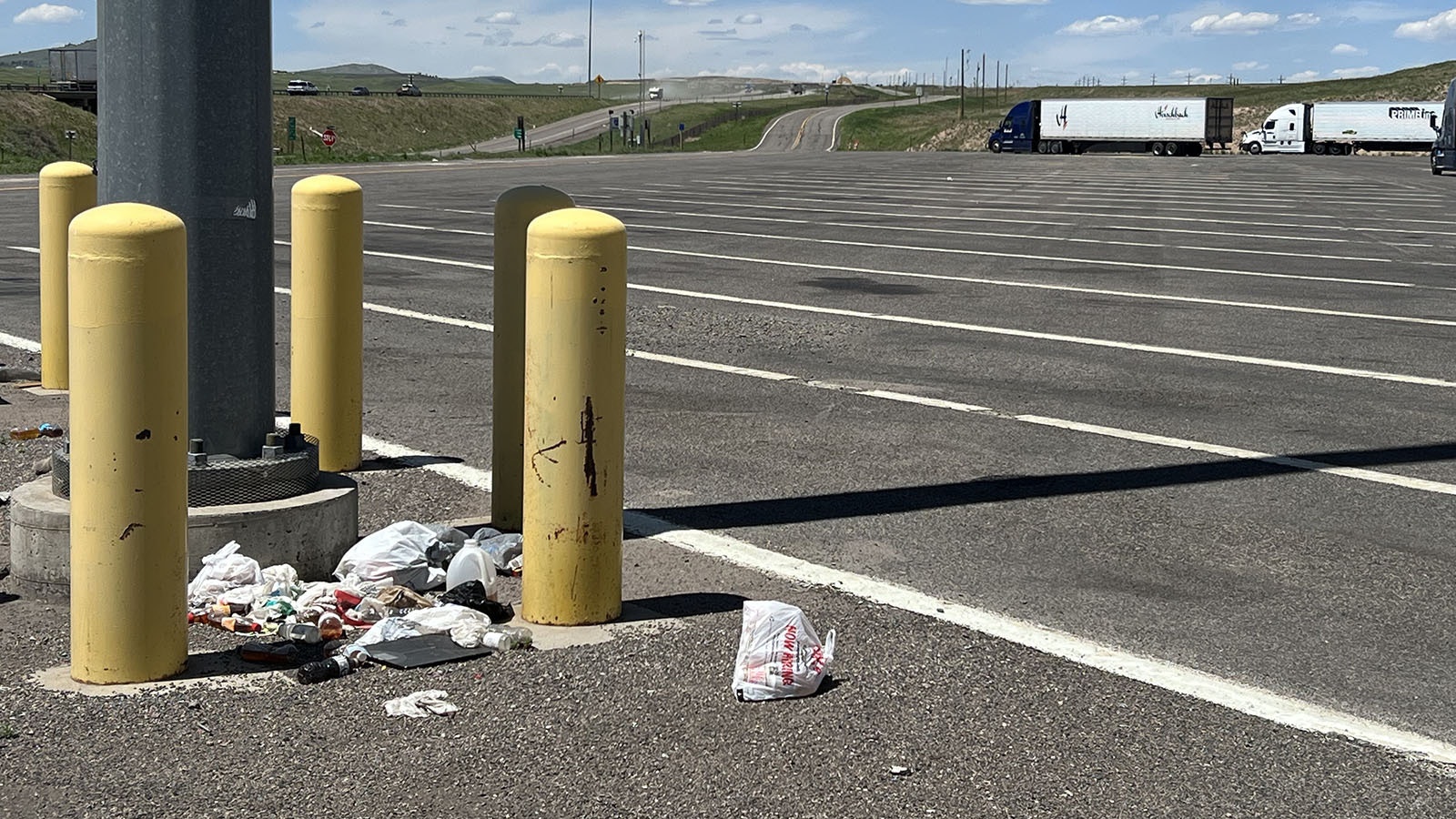 Although there's a large, empty dumpster at the west end of this rest stop along westbound Interstate 80 at exit 345, trash still piles up in the lot.