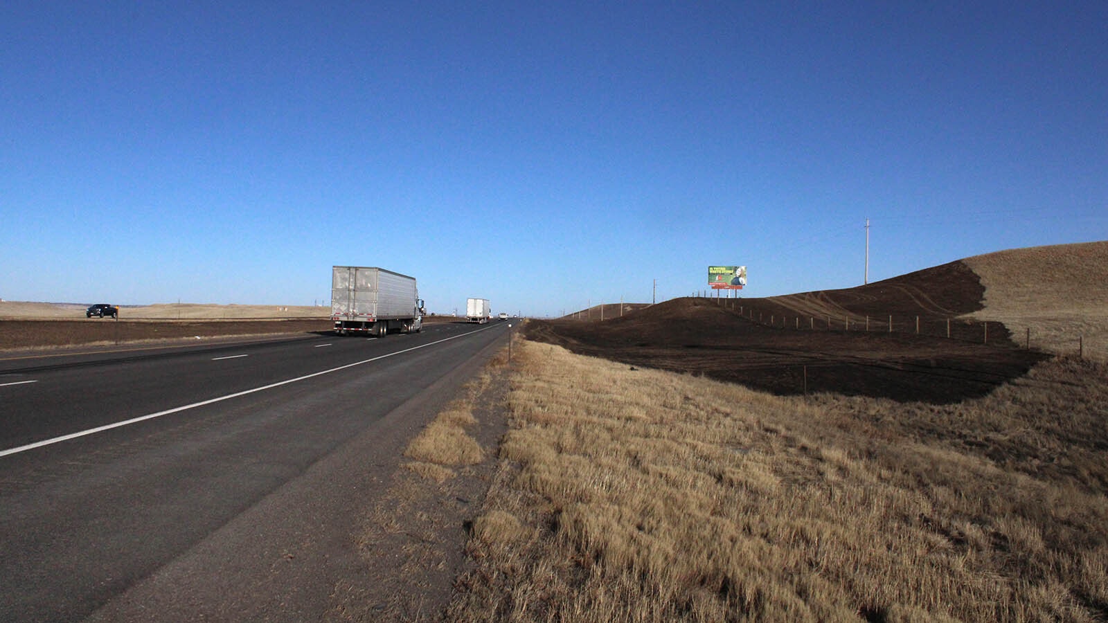 A fast-moving grass fire jumped sections of Interstate 80 about 7 miles west of Cheyenne on Saturday.