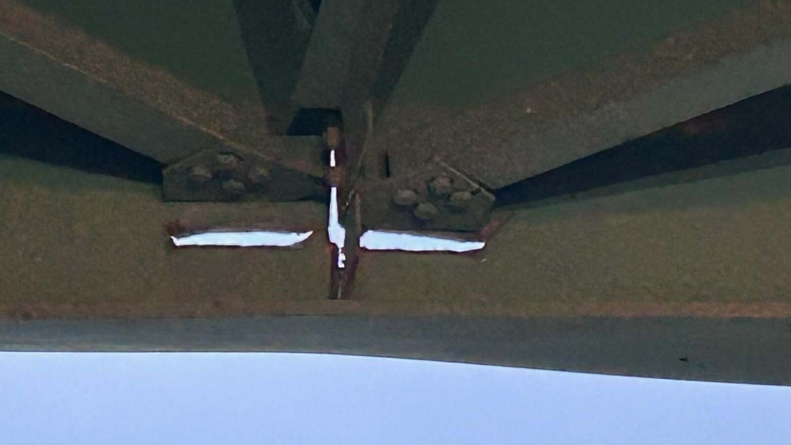 Damage to the structure of the Interstate 90 overpass at Beulah, Wyoming.