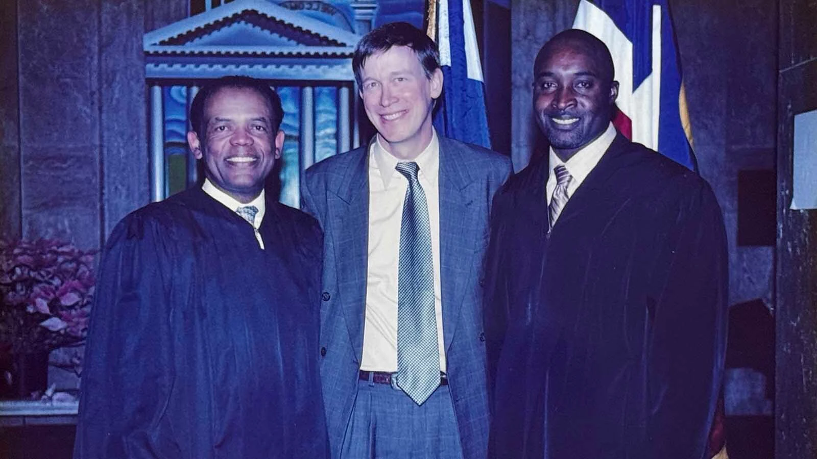 Judge Andre Rudolph, right in a photo with former Colorado Gov. John Hickenlooper, grew up in Cheyenne, played running back for UW and once ran down a defendant to earn the nickname “Batman.” Before his sudden death this month, he also changed the lives of lawbreakers willing to take his help and accountability.
