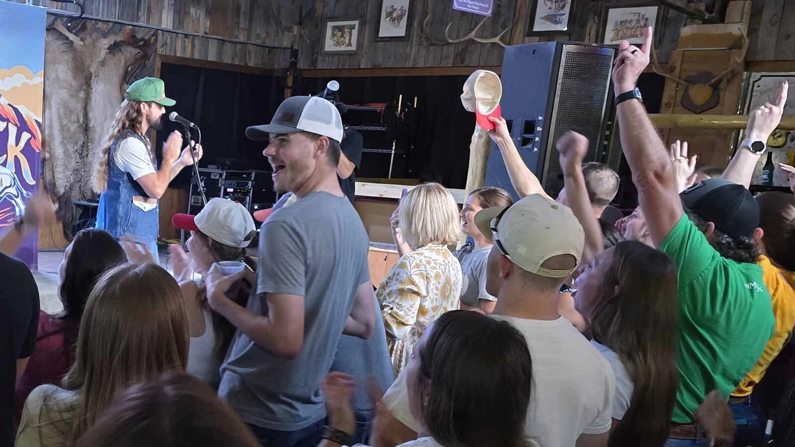Ian Munsick talks to a jam-packed crowd at the Cowboy Saloon & Dance Hall in Laramie about his most recent album, The Mountain Goat, which is the first under his independent label, West to the Rest Records, in partnership with Triple Tigers Records.