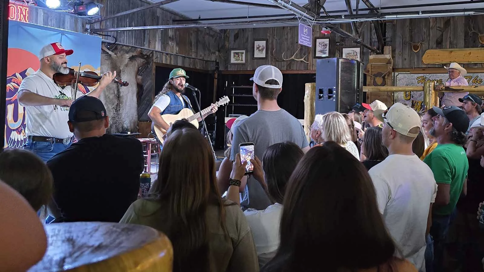 Ian Munsick performs for a jam-packed crowd at the Cowboy Saloon & Dance Hall in Laramie to promote his most recent album, The Mountain Goat. It's his fourth studio album, but the first under his independent label, West to the Rest Records, in partnership with Triple Tigers Records.